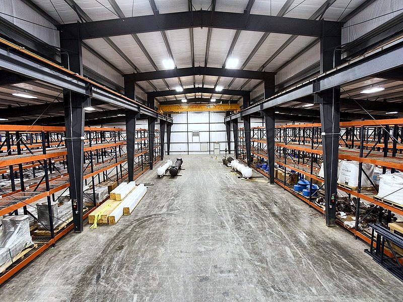 Warehouse interior with steel framing and pallet racking